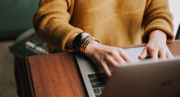 female-typing-on-laptop