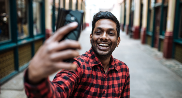 Micro-influencer filming a video for a hospitality venue